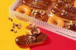 Krispy Kreme Baru Meluncurkan Tiga Twix Donuts, dan Satunya Diisi Dengan Candy Bar Ukuran Penuh